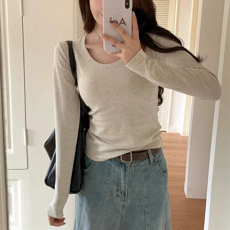 A simple straight-shoulder V-neck base layer top