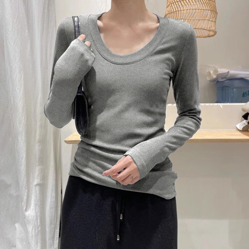 A simple straight-shoulder V-neck base layer top
