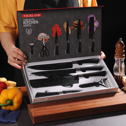 A six-piece set of black-edge kitchen knives