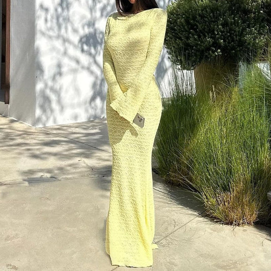 A slimming backless long dress