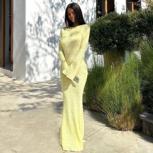 A slimming backless long dress