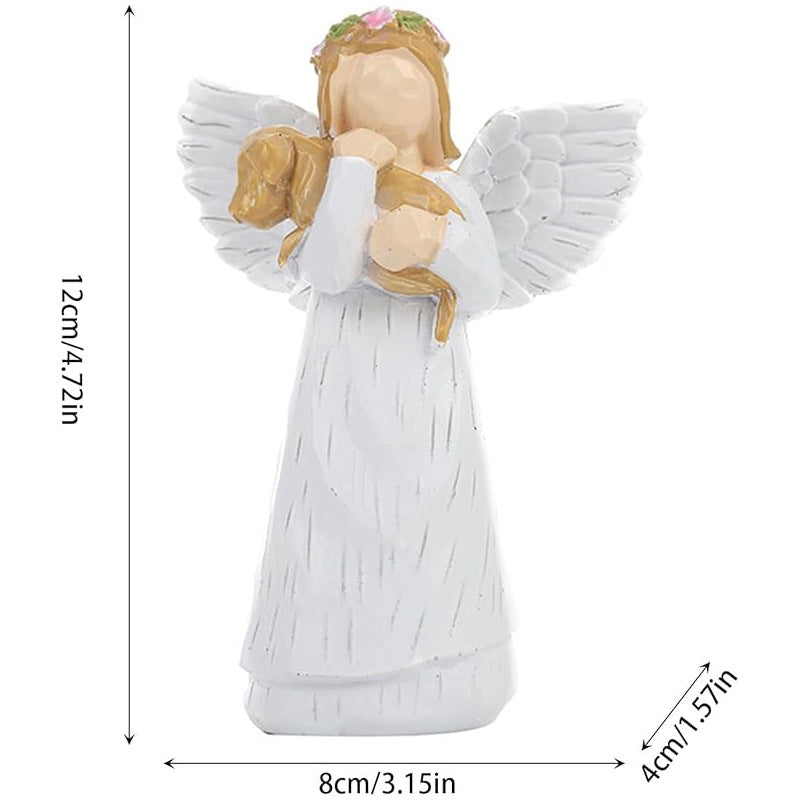 A souvenir table ornament of the Angel holding a dog