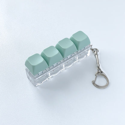 A squeezable charm pendant