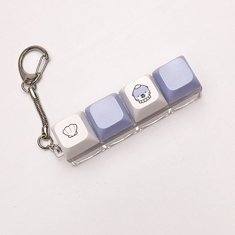 A squeezable charm pendant