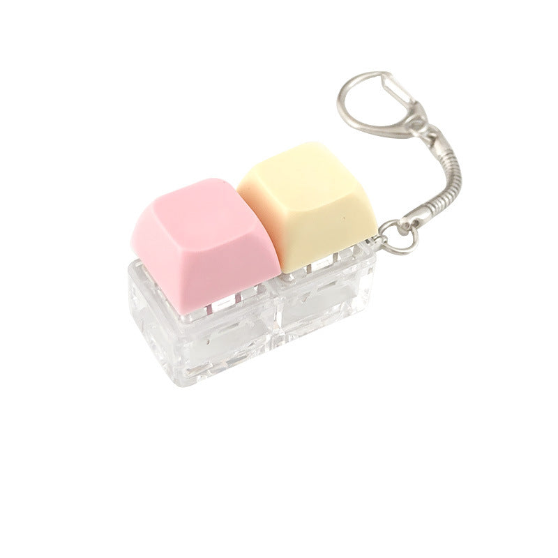 A squeezable charm pendant