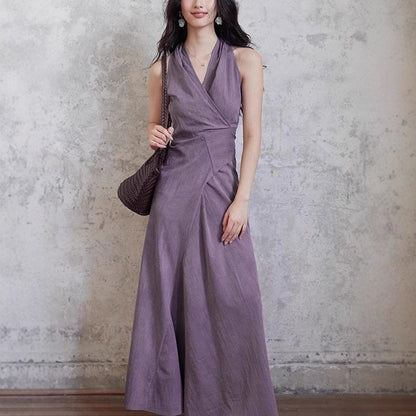 A stylish purple V-neck halter-neck long dress with a lace-up design for women