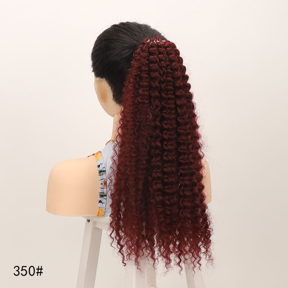 A synthetic ponytail made of synthetic fibers