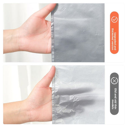 A thick, large silver-gray plastic bag