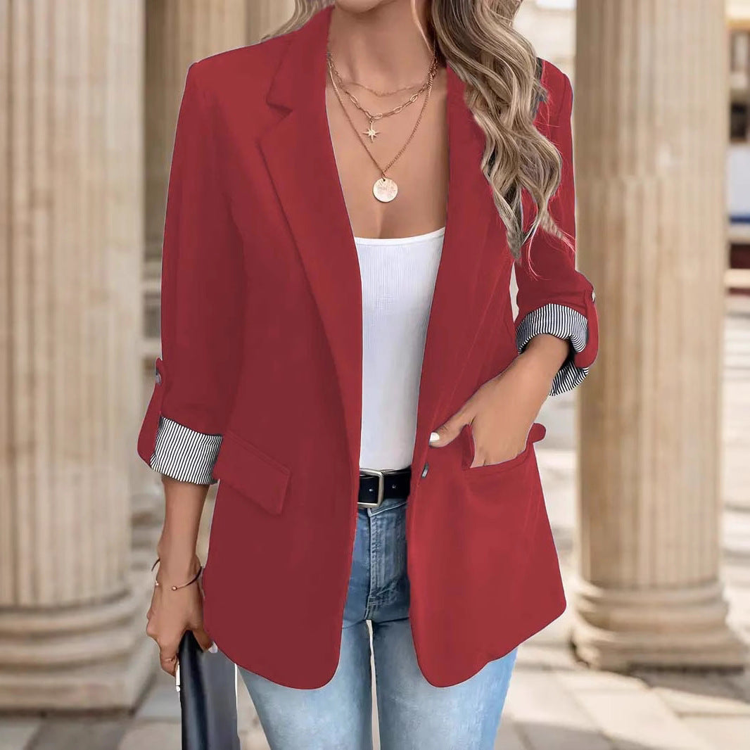 A three-quarter rolled-up sleeve suit jacket