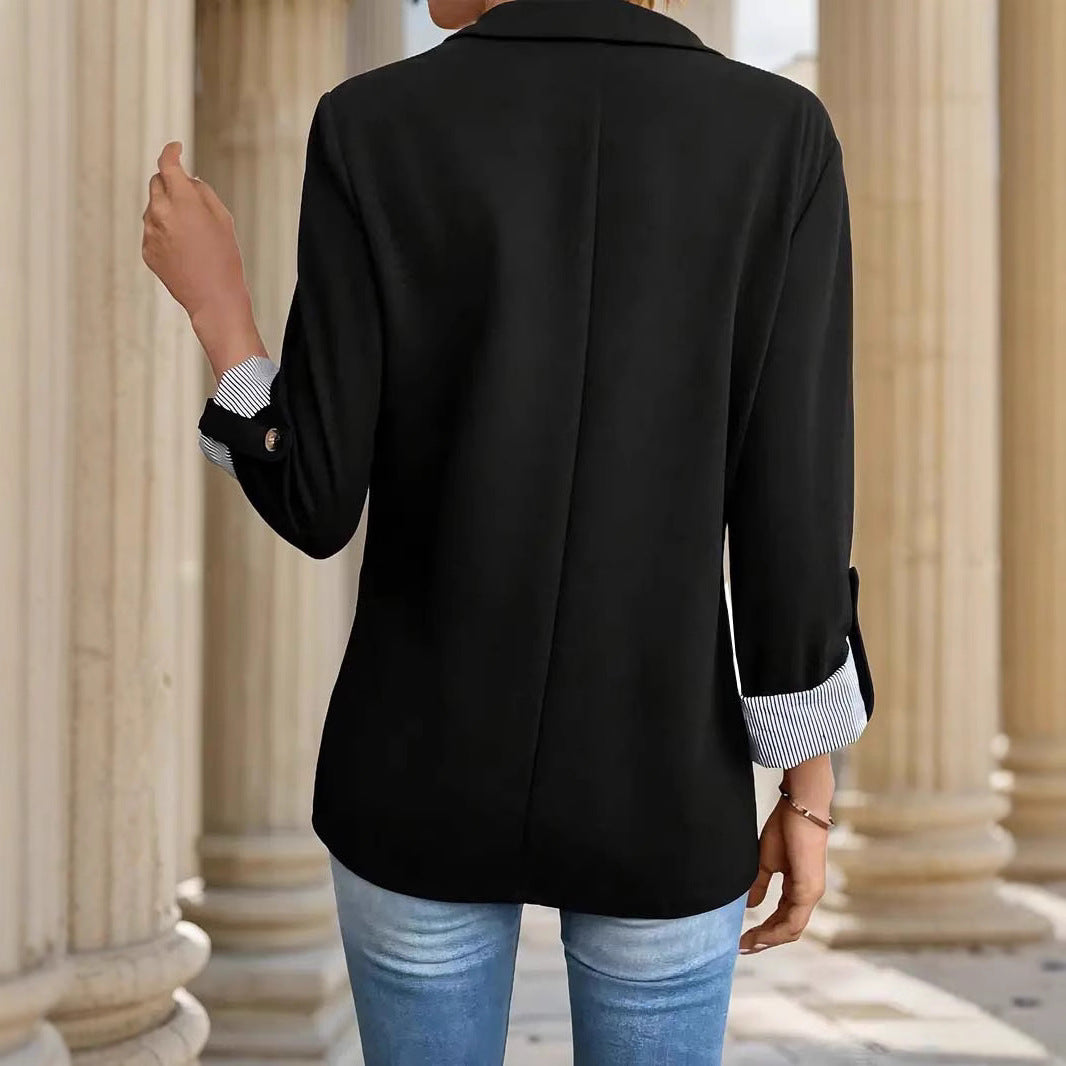 A three-quarter rolled-up sleeve suit jacket
