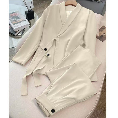 A two-piece suit jacket and wide-leg pants