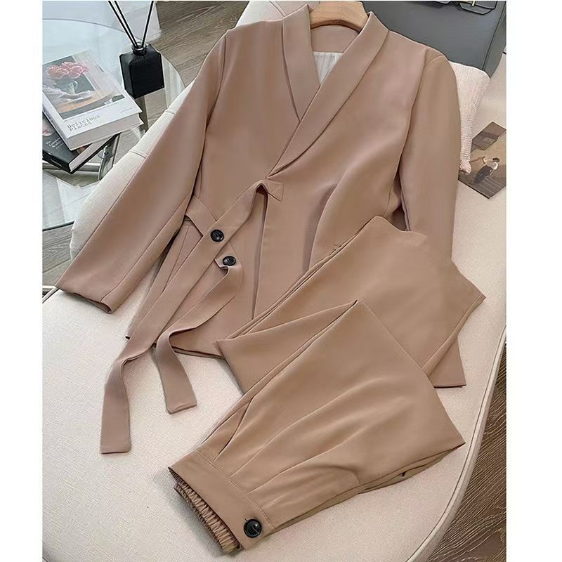 A two-piece suit jacket and wide-leg pants