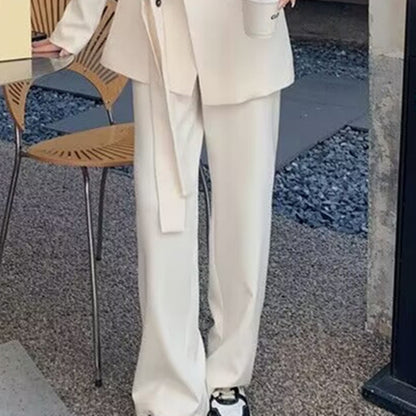 A two-piece suit jacket and wide-leg pants
