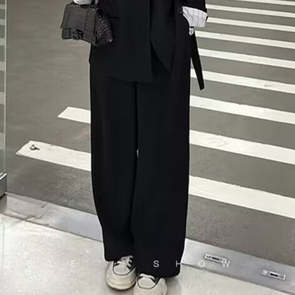 A two-piece suit jacket and wide-leg pants