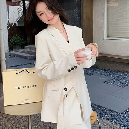 A two-piece suit jacket and wide-leg pants