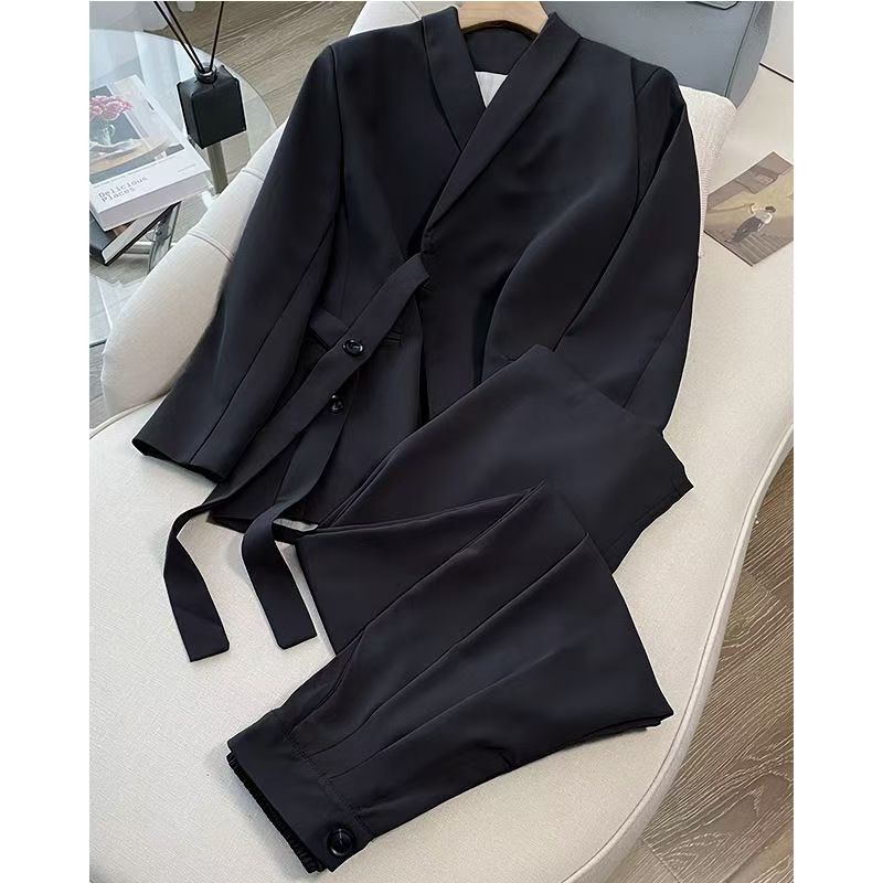 A two-piece suit jacket and wide-leg pants