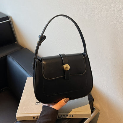 A versatile small square bag