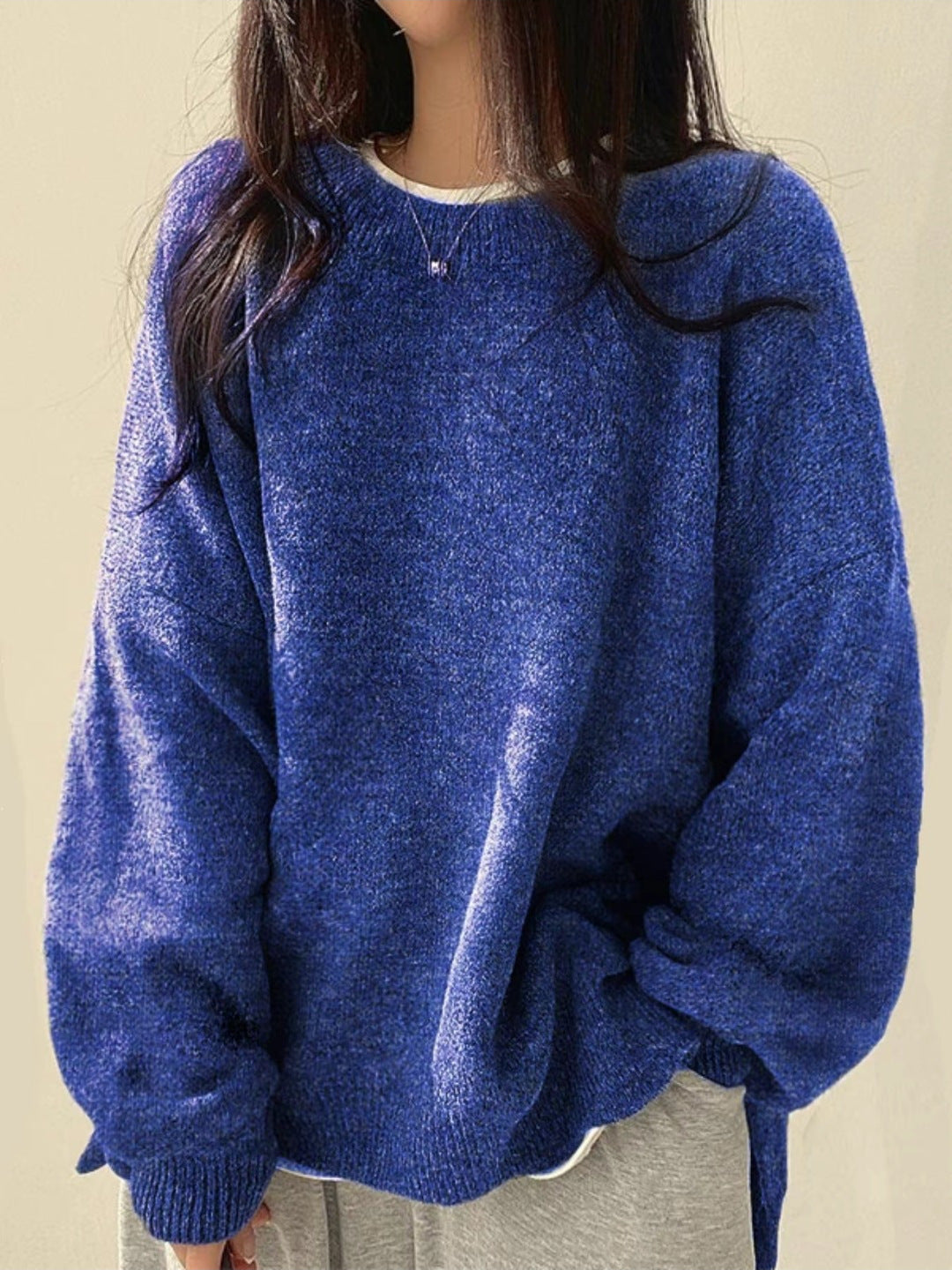 A versatile solid-colored sweater