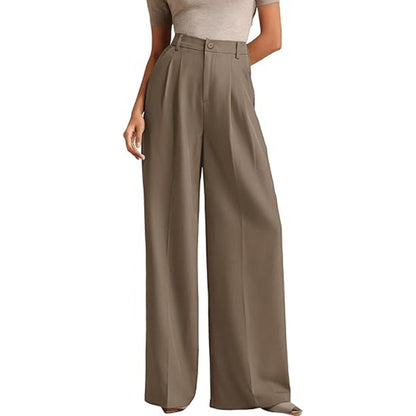 A woman in a high-waisted suit pants