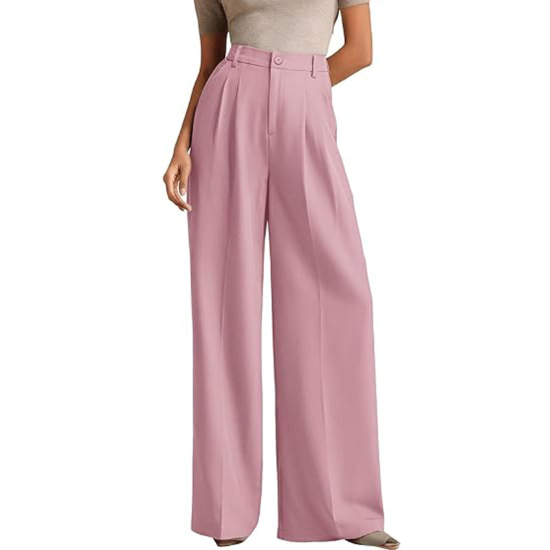 A woman in a high-waisted suit pants