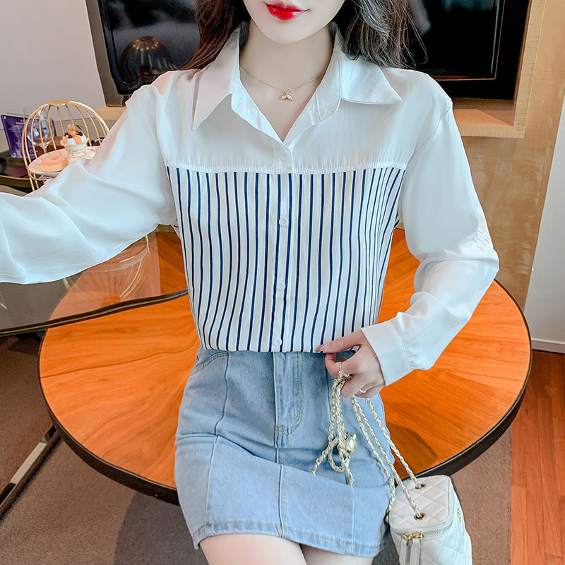 A woman in a long-sleeved top and a striped patchwork shirt