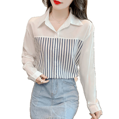 A woman in a long-sleeved top and a striped patchwork shirt