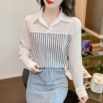 A woman in a long-sleeved top and a striped patchwork shirt