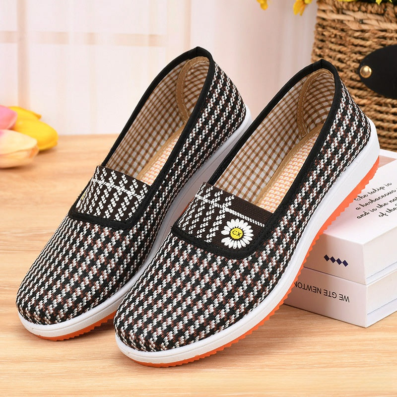 A woman wearing canvas shoes