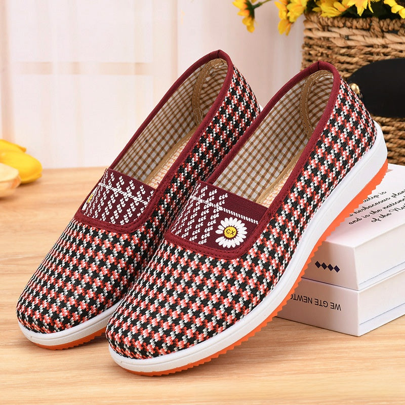 A woman wearing canvas shoes