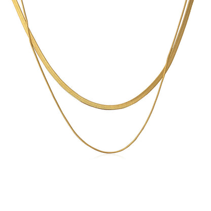 A woman with a retro double-layered snake bone and a collarbone chain