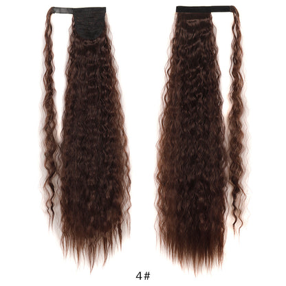 A woman with a wig and a ponytail