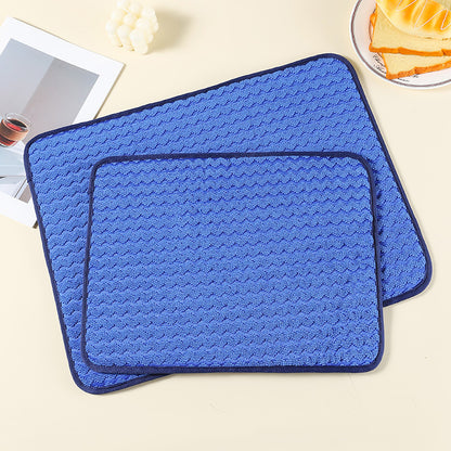 Absorbent dry material pad