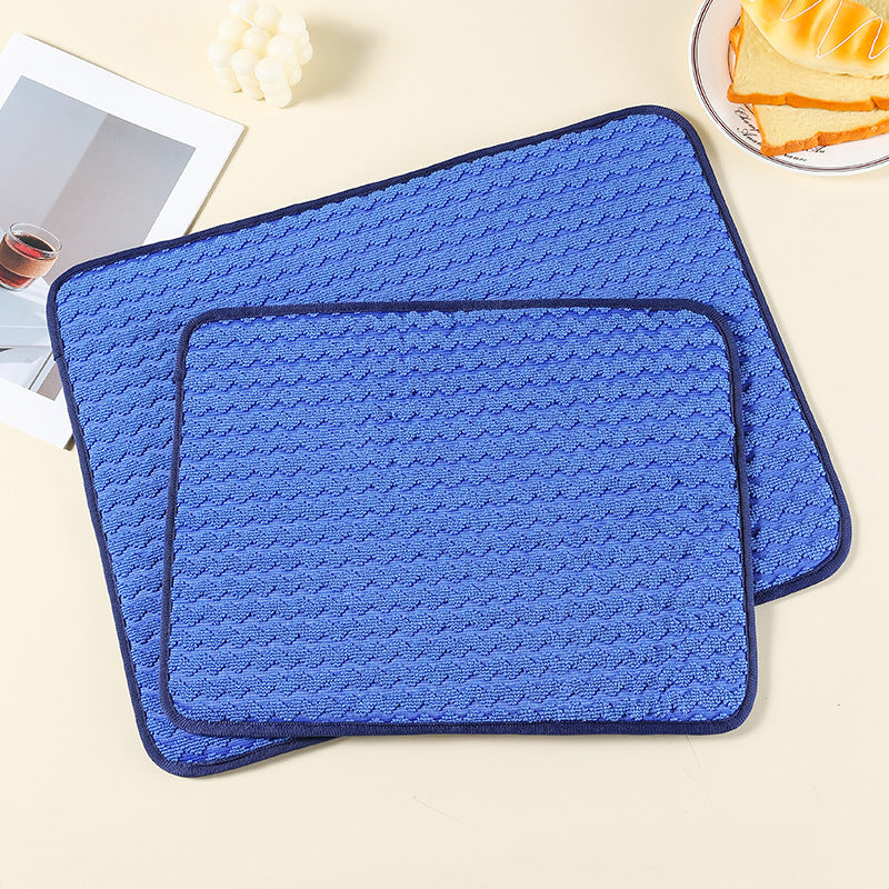 Absorbent dry material pad