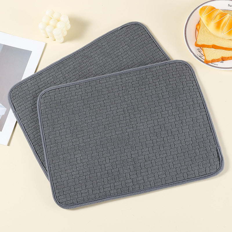 Absorbent dry material pad
