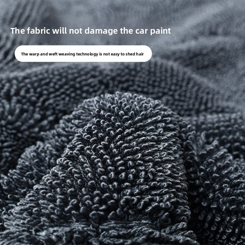 Absorbent towel with seamless water absorption