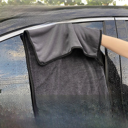 Absorbent towel with seamless water absorption