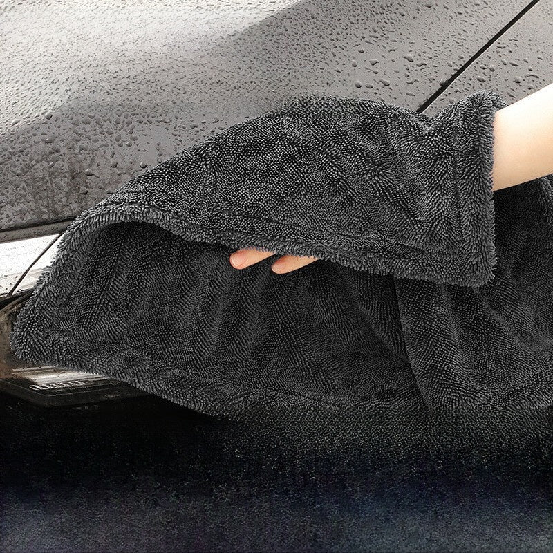 Absorbent towel with seamless water absorption