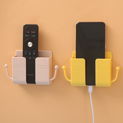 Adhesive phone charging stand
