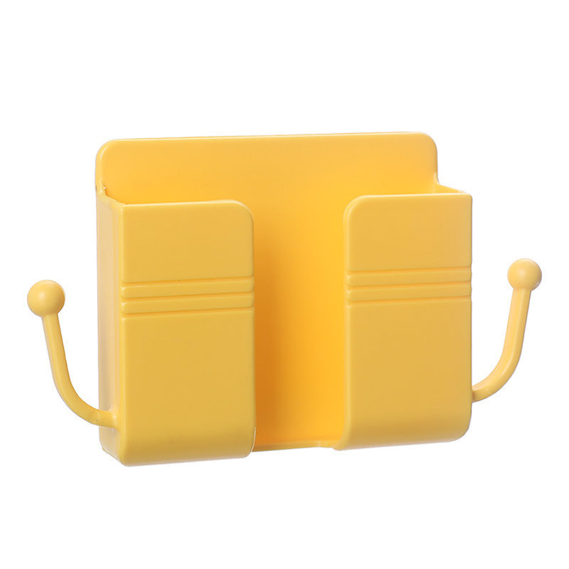Adhesive phone charging stand
