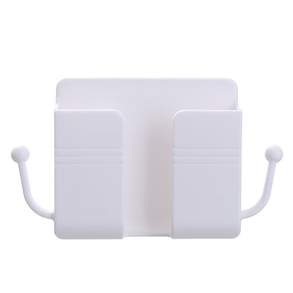 Adhesive phone charging stand