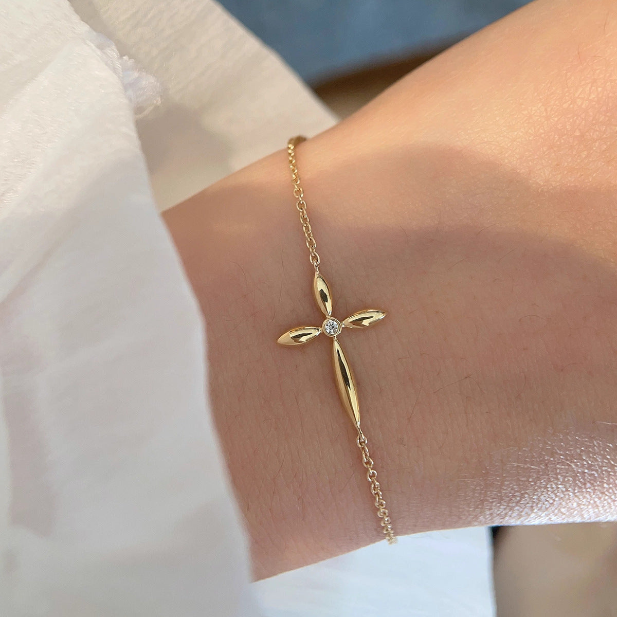 Adjustable Sterling Silver Cross Bracelet with Gold Plating