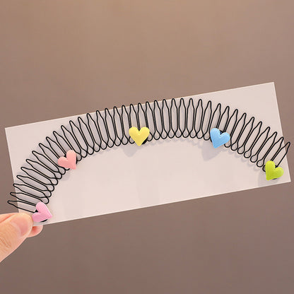 An extended version of a children's hair trimming tool