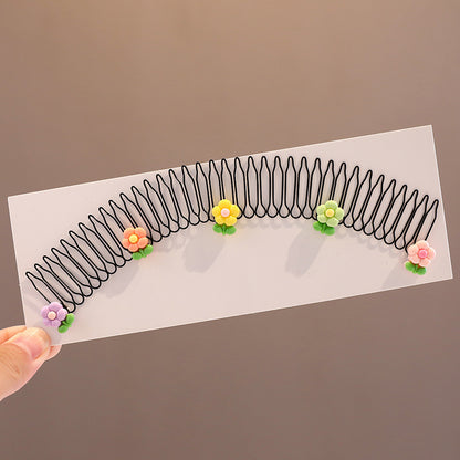 An extended version of a children's hair trimming tool