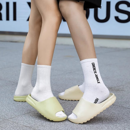 Anti-odor slippers with a feeling of stepping on feces