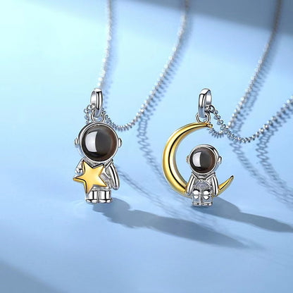 Astronaut's pendant featuring stars and the moon