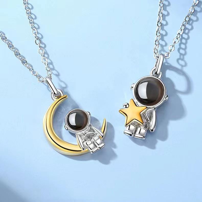 Astronaut's pendant featuring stars and the moon