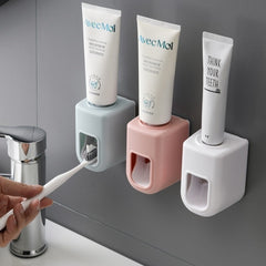 Automatic toothpaste dispenser pink