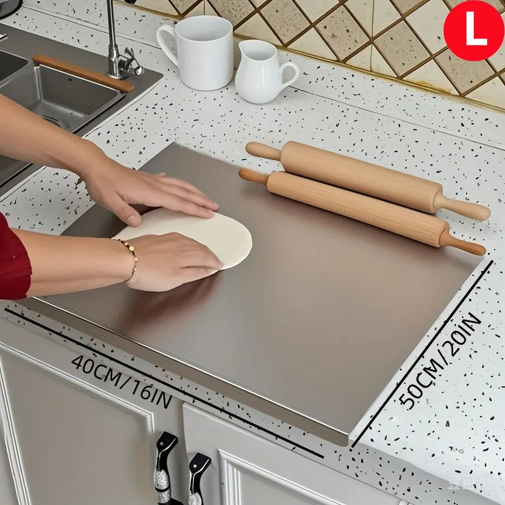 Stainless steel cutting board, large 50 x 40 cm, on a kitchen counter