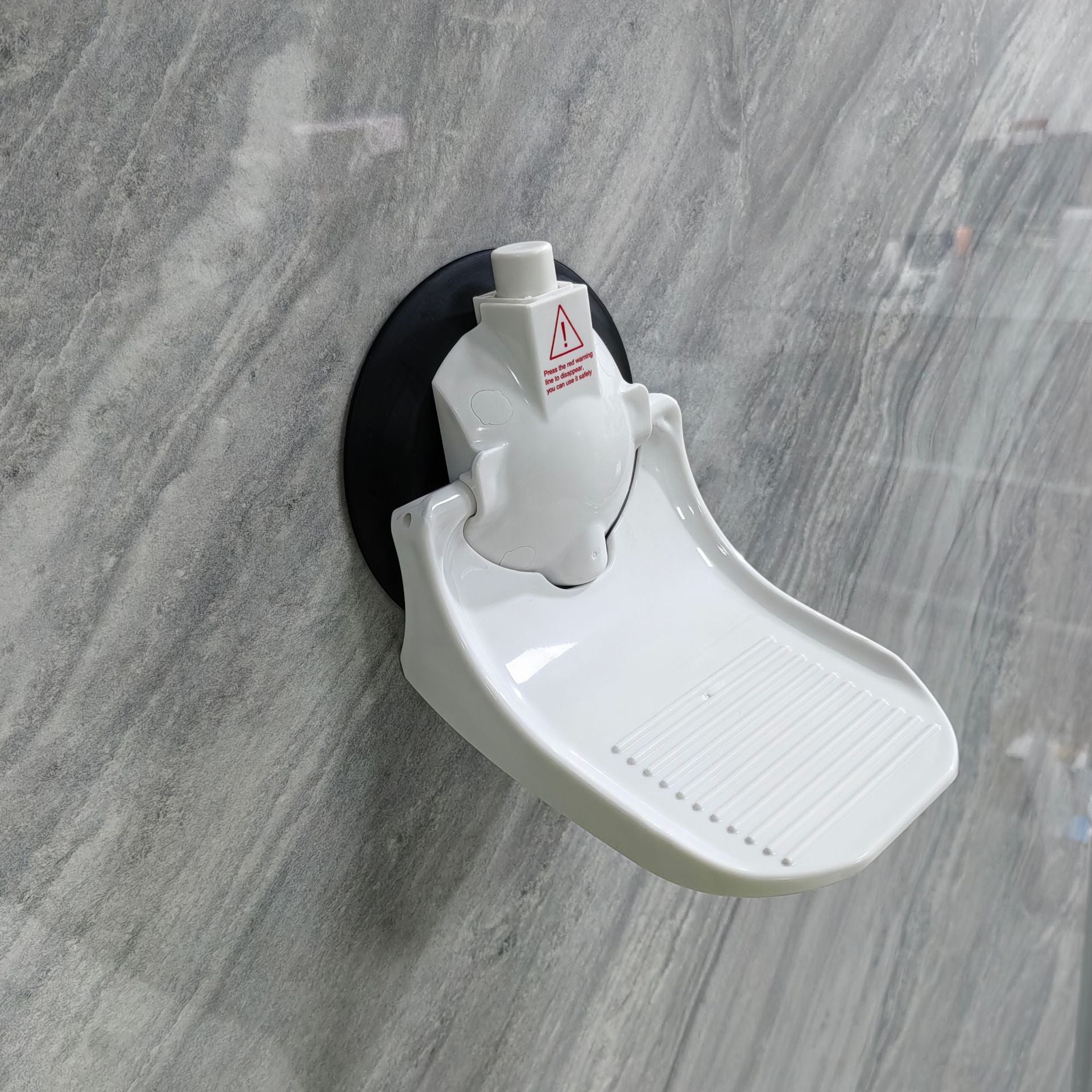 Bathroom suction cup footrest