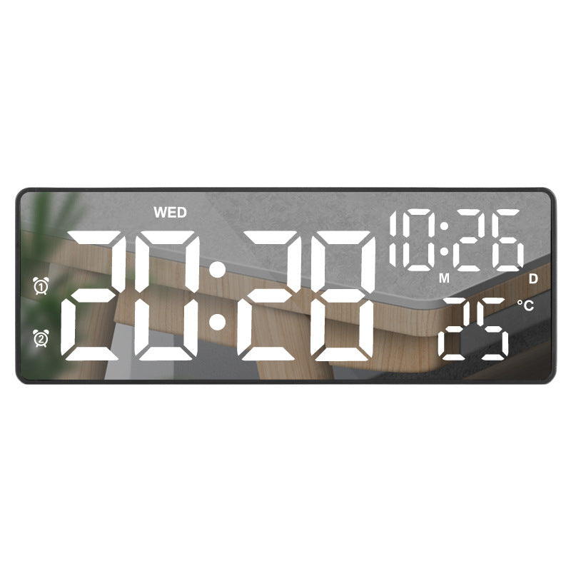Battery-powered plug-in alarm clock